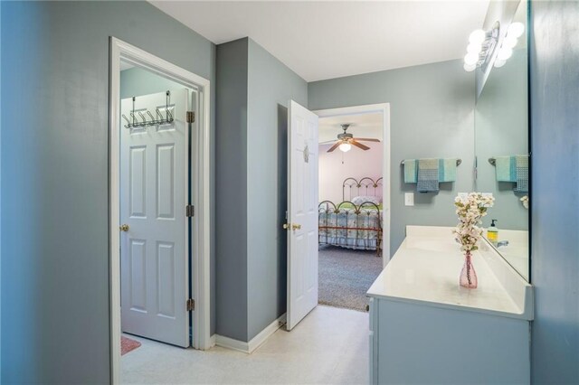 carpeted bedroom featuring visible vents, a ceiling fan, and baseboards