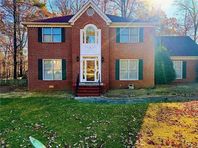 view of front facade featuring a front yard