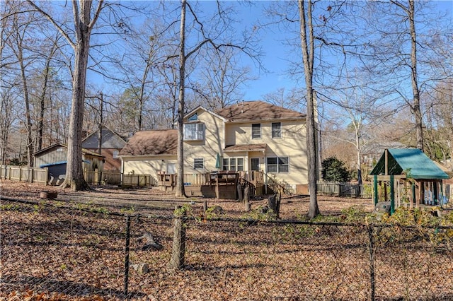 view of front of home featuring a playground