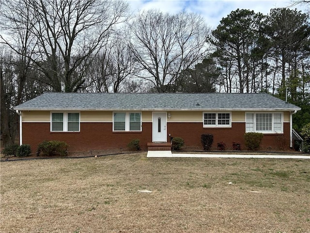 ranch-style house with a front yard