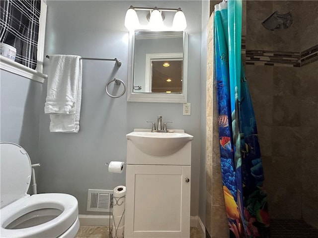 5862 Kitchens Rd SE, Mableton, GA 30126 - bathroom featuring vanity, toilet, and walk in shower