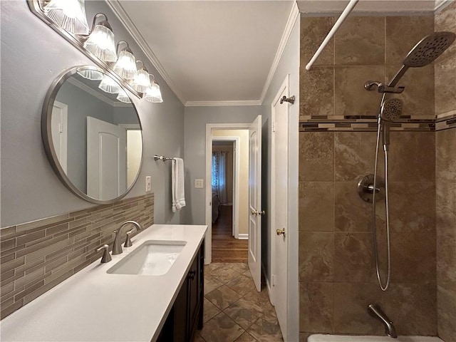 5862 Kitchens Rd SE, Mableton, GA 30126 - bathroom featuring ornamental molding, tiled shower / bath combo, decorative backsplash, and vanity