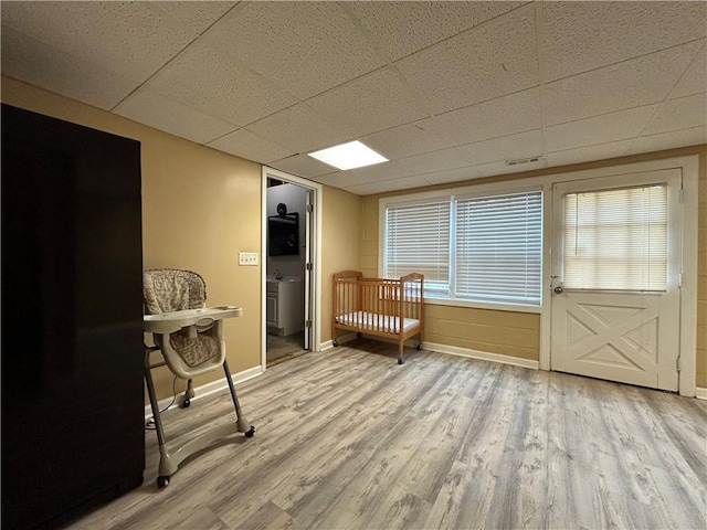 5862 Kitchens Rd SE, Mableton, GA 30126 - sitting room with sink, a drop ceiling, and light hardwood / wood-style floors