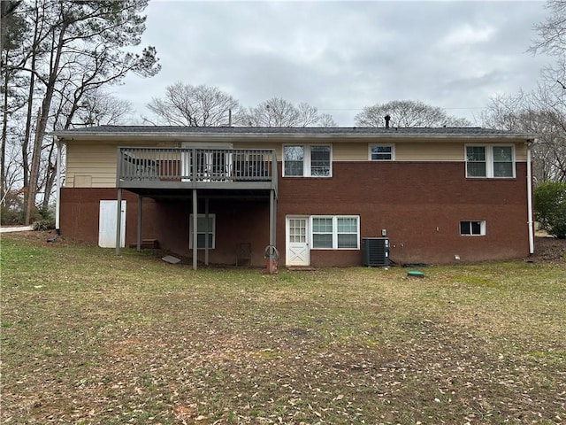 5862 Kitchens Rd SE, Mableton, GA 30126 - rear view of house featuring a wooden deck, a yard, and central AC unit