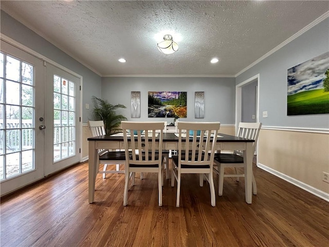 5862 Kitchens Rd SE, Mableton, GA 30126 - dining room featuring dark wood-type flooring, ornamental molding, french doors, and a textured ceiling