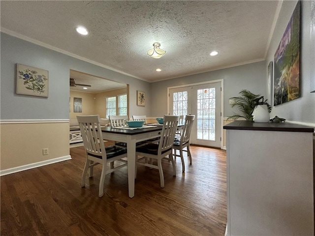 5862 Kitchens Rd SE, Mableton, GA 30126 - dining space with dark wood-type flooring, crown molding, french doors, and a textured ceiling