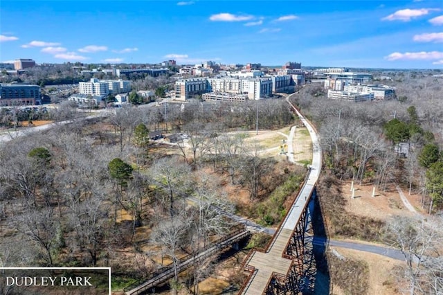 birds eye view of property featuring a city view