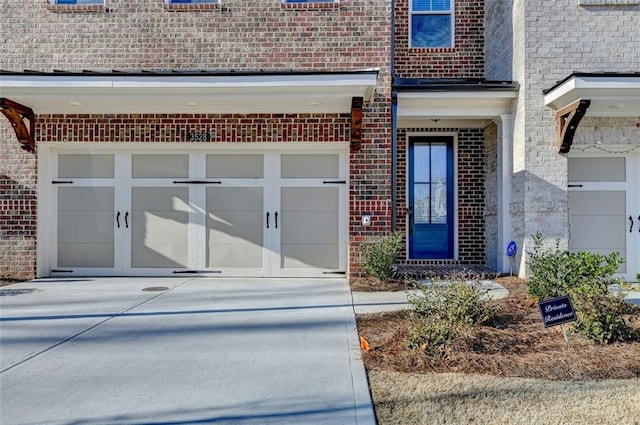 property entrance with a garage