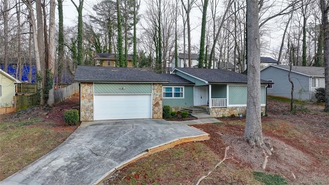 ranch-style home with a garage