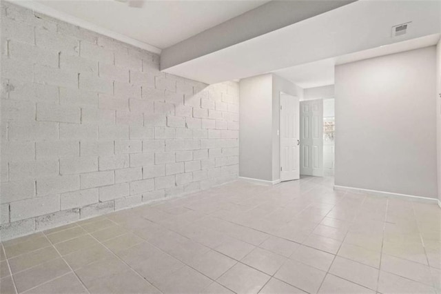 spare room with light tile patterned floors