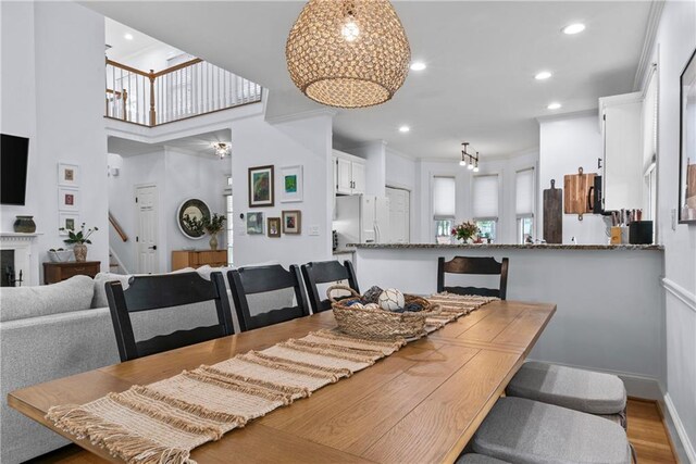 dining room featuring hardwood / wood-style flooring and a notable chandelier