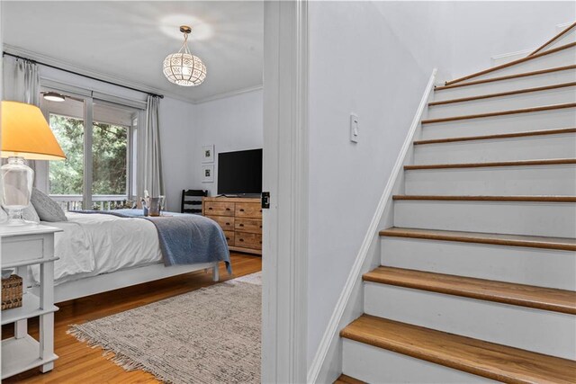 bedroom with light hardwood / wood-style floors