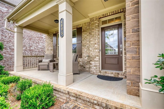 4895 Sterling Close, Buford, GA 30518 - entrance to property featuring covered porch and brick siding