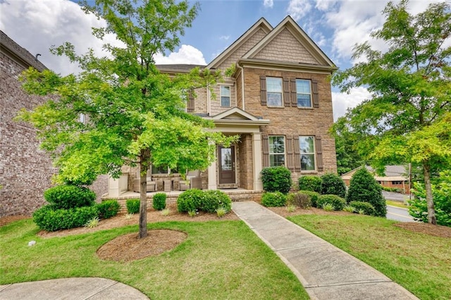 4895 Sterling Close, Buford, GA 30518 - view of front facade with a front lawn
