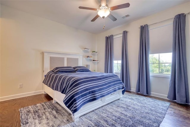 4895 Sterling Close, Buford, GA 30518 - bedroom featuring a ceiling fan and wood finished floors