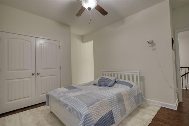 4895 Sterling Close, Buford, GA 30518 - bedroom featuring wood finished floors, a closet, and ceiling fan
