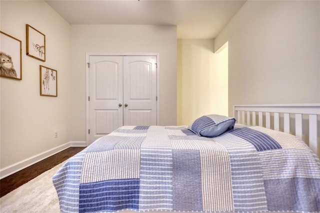 4895 Sterling Close, Buford, GA 30518 - bedroom featuring a closet and dark wood finished floors