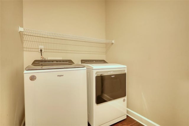 4895 Sterling Close, Buford, GA 30518 - washroom featuring independent washer and dryer and wood finished floors