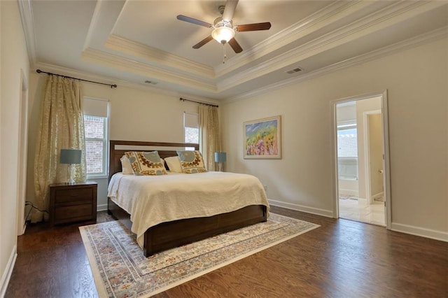 4895 Sterling Close, Buford, GA 30518 - bedroom with multiple windows, a tray ceiling, ornamental molding, wood finished floors, and ensuite bath
