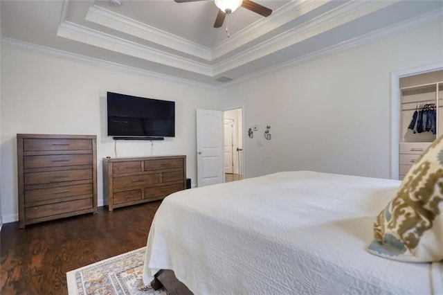 4895 Sterling Close, Buford, GA 30518 - bedroom with wood finished floors, ornamental molding, a tray ceiling, and a ceiling fan