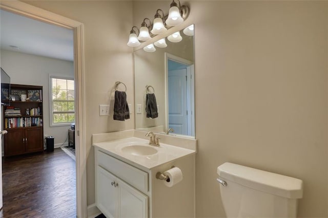 4895 Sterling Close, Buford, GA 30518 - bathroom featuring vanity, wood finished floors, and a chandelier