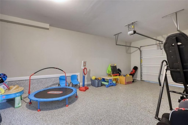 4895 Sterling Close, Buford, GA 30518 - garage with a garage door opener and baseboards