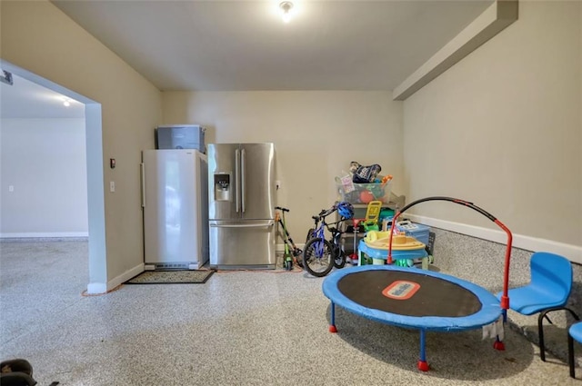 4895 Sterling Close, Buford, GA 30518 - game room with baseboards and speckled floor