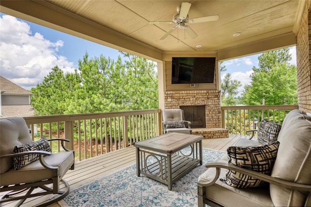 4895 Sterling Close, Buford, GA 30518 - deck with a ceiling fan and an outdoor living space with a fireplace