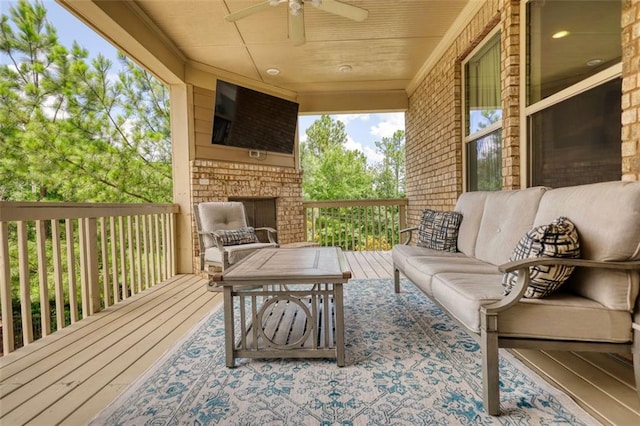 4895 Sterling Close, Buford, GA 30518 - deck with an outdoor living space with a fireplace and a ceiling fan