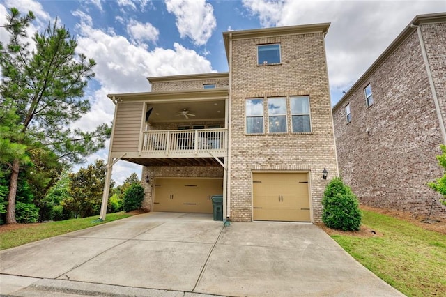 4895 Sterling Close, Buford, GA 30518 - view of front facade featuring brick siding, an attached garage, a ceiling fan, concrete driveway, and a balcony
