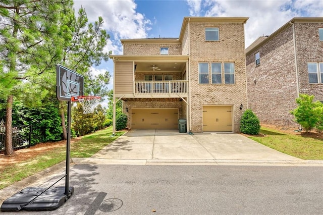 4895 Sterling Close, Buford, GA 30518 - view of front of property featuring brick siding, concrete driveway, a garage, and a balcony
