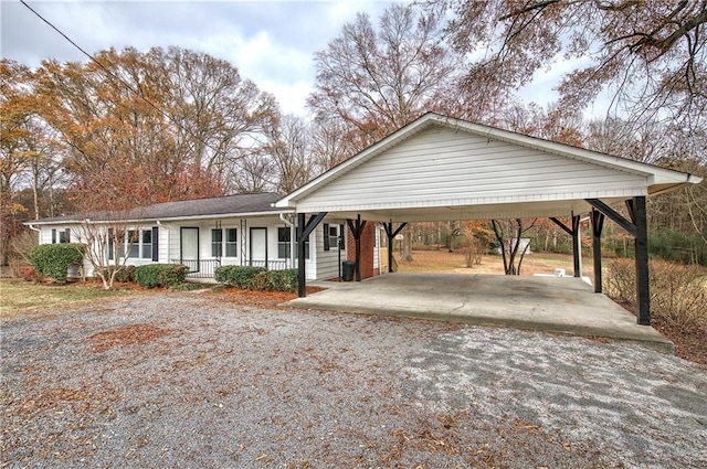 ranch-style house featuring covered porch