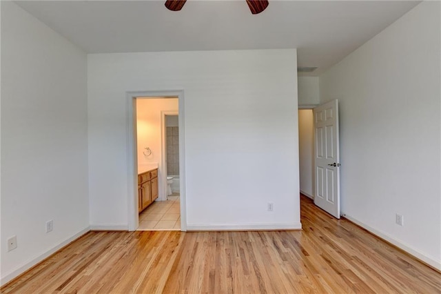 7405 Ledgewood Way, Suwanee, GA 30024 - unfurnished bedroom with light wood finished floors and ensuite bath