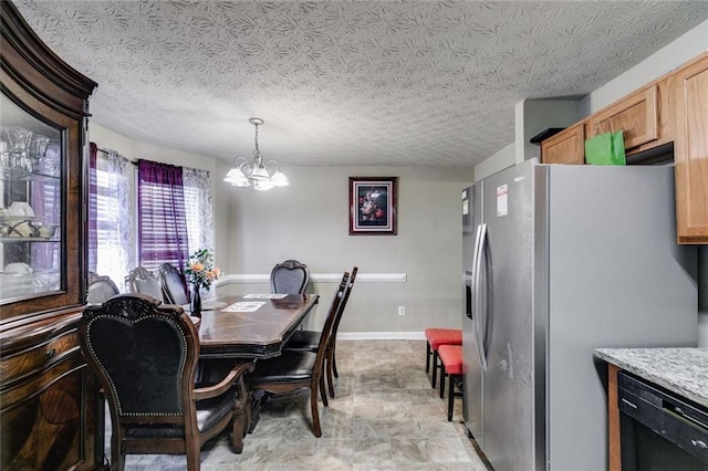 674 Fairview Dr, Dallas, GA 30157 - dining room featuring a chandelier, baseboards, a textured ceiling, and stone finish flooring