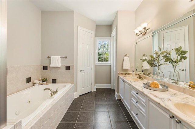 bathroom featuring dual bowl vanity, tile flooring, and a relaxing tiled bath