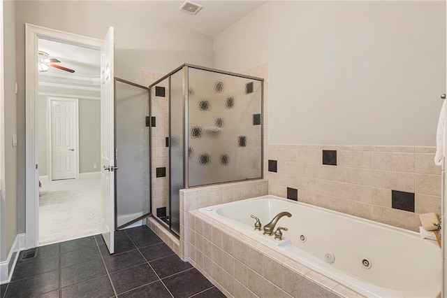 bathroom with ceiling fan, separate shower and tub, and tile floors