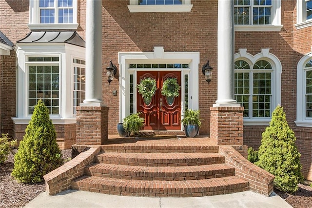 entrance to property featuring french doors