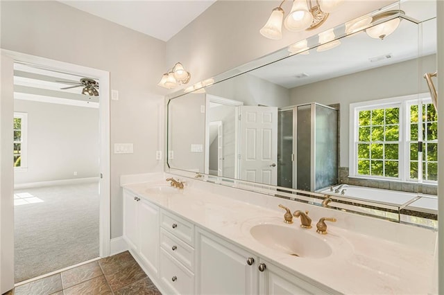 bathroom with oversized vanity, double sink, ceiling fan, independent shower and bath, and tile floors