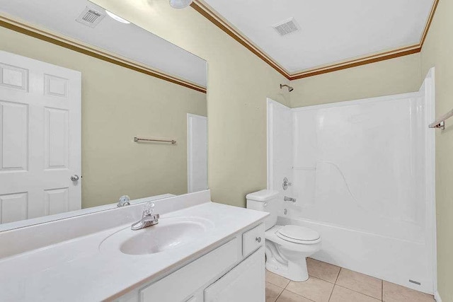 full bathroom with tile patterned floors, bathtub / shower combination, vanity, crown molding, and toilet