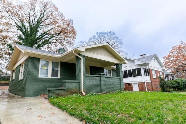 view of front of home with a front yard