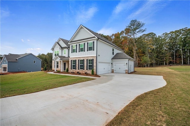 view of front facade featuring a garage and a front lawn