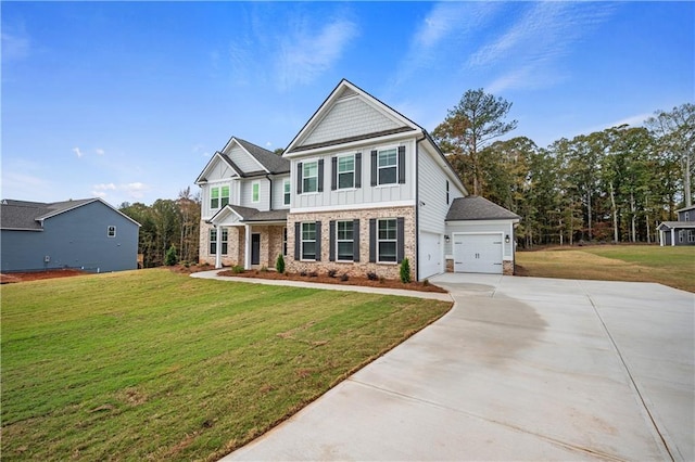 view of front of property featuring a garage and a front lawn