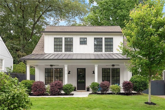 313 Sisson Ave NE, Atlanta, GA 30317 - modern farmhouse featuring ceiling fan, a standing seam roof, and board and batten siding