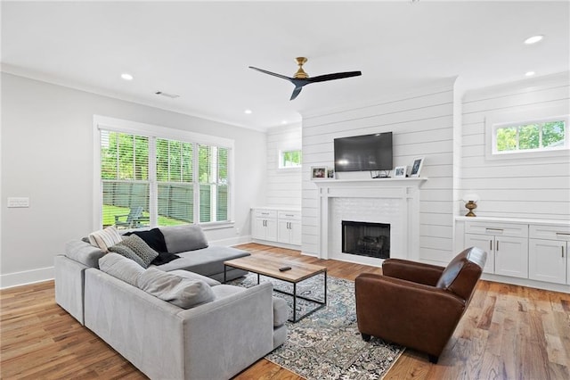 313 Sisson Ave NE, Atlanta, GA 30317 - living room featuring plenty of natural light, baseboards, ceiling fan, a fireplace, and recessed lighting