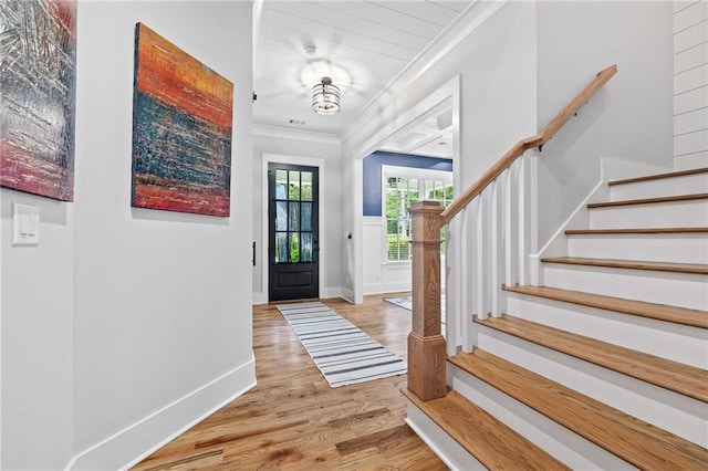 313 Sisson Ave NE, Atlanta, GA 30317 - entrance foyer with ornamental molding, wood finished floors, stairs, and baseboards
