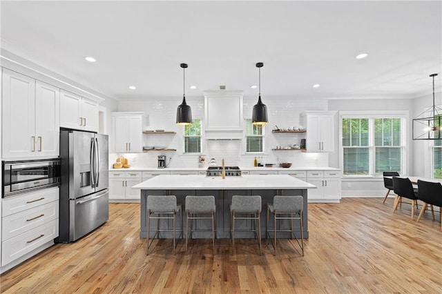 313 Sisson Ave NE, Atlanta, GA 30317 - kitchen with open shelves, appliances with stainless steel finishes, light countertops, ornamental molding, and recessed lighting