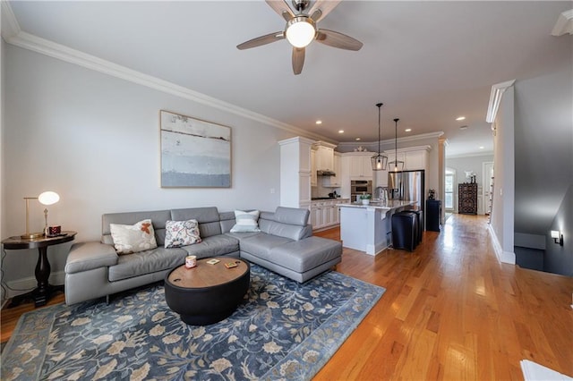 359 Alderwood Ln, Atlanta, GA 30328 - living area with light wood-style flooring, ceiling fan, ornamental molding, baseboards, and recessed lighting