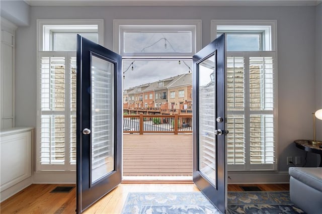 359 Alderwood Ln, Atlanta, GA 30328 - doorway featuring french doors, wood finished floors, and ornamental molding