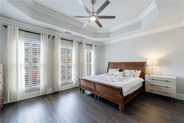 359 Alderwood Ln, Atlanta, GA 30328 - bedroom with a raised ceiling, ornamental molding, dark wood-style flooring, ceiling fan, and baseboards