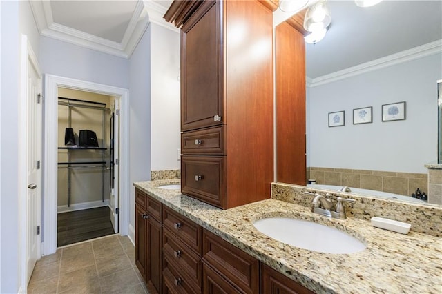 359 Alderwood Ln, Atlanta, GA 30328 - full bath with crown molding, tile patterned flooring, double vanity, a walk in closet, and baseboards